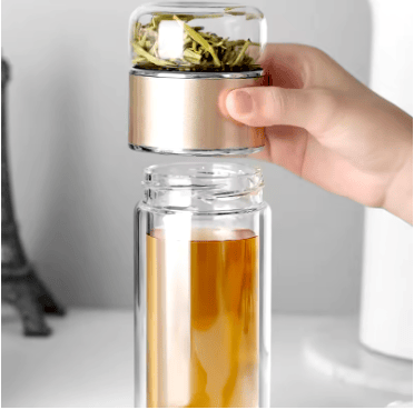 Double-layer thickened tea and water separation glass